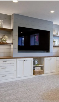 Custom entertainment centre built-in with warm wood surround
