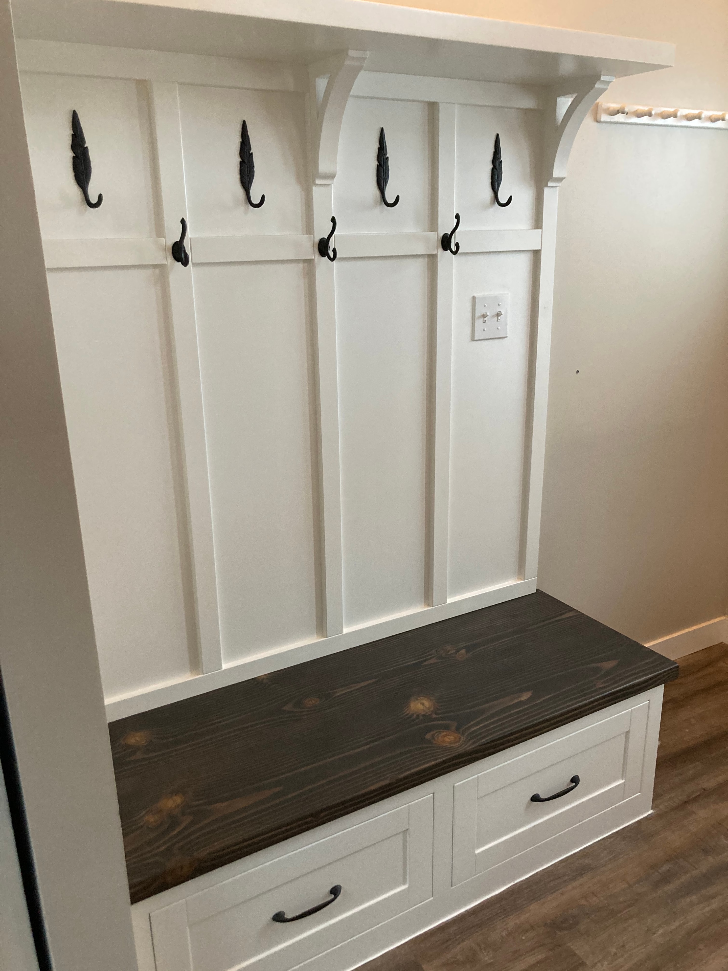 Custom Murphy bed with flanking built-in shelving units